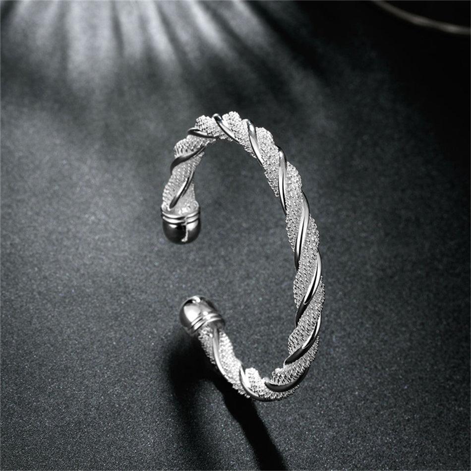 Andromeda Twisted Silver Bangle / 925 Sterling Silver - Nina Kane Jewellery
