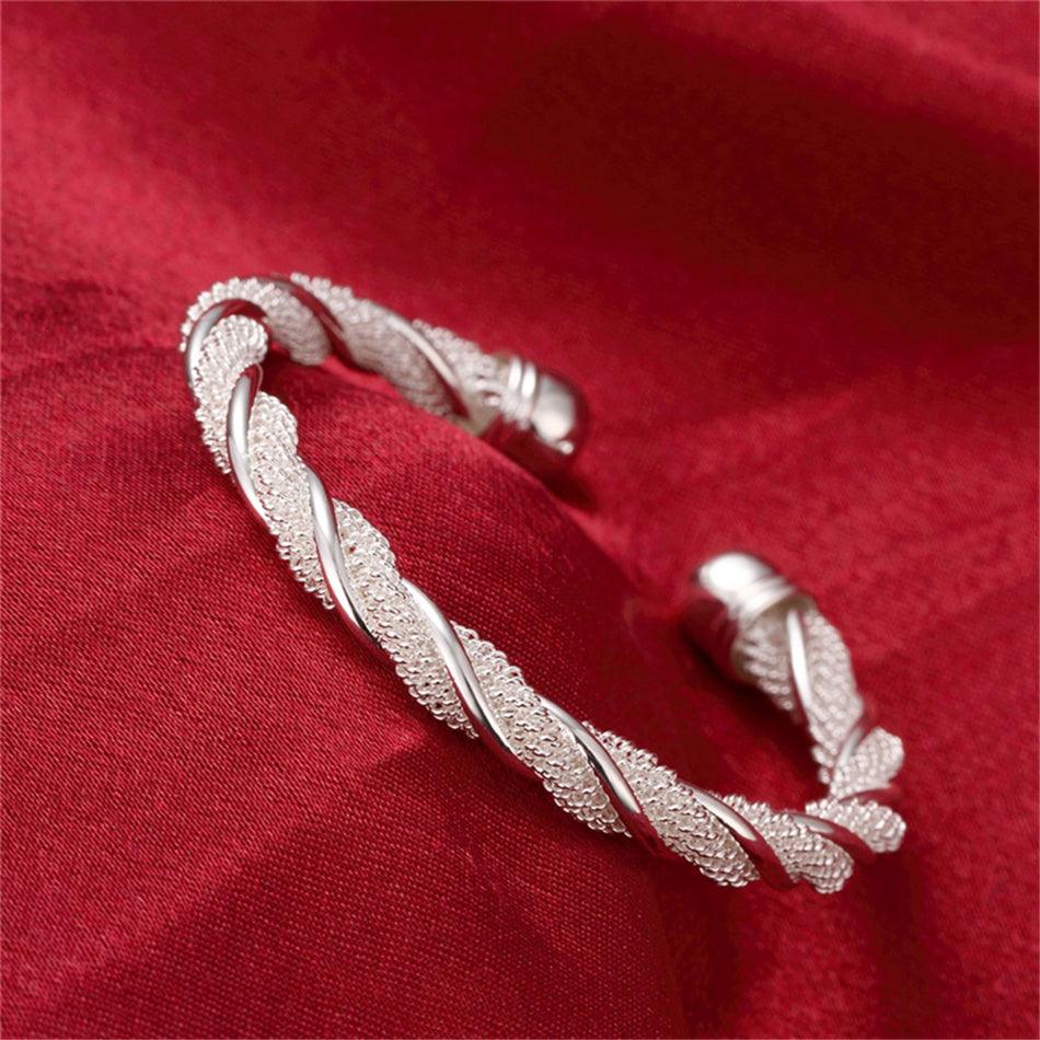 Andromeda Twisted Silver Bangle / 925 Sterling Silver - Nina Kane Jewellery