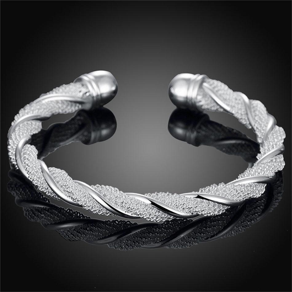 Andromeda Twisted Silver Bangle / 925 Sterling Silver - Nina Kane Jewellery