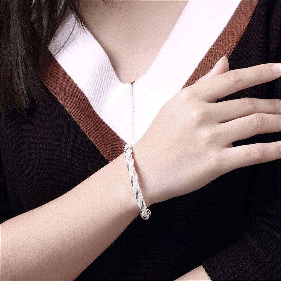Andromeda Twisted Silver Bangle / 925 Sterling Silver - Nina Kane Jewellery