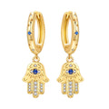 The Hamsa Hand Huggie Earrings view 1