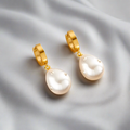 Ariel Oversize Pearl Huggie Earrings / Stainless Steel view 1